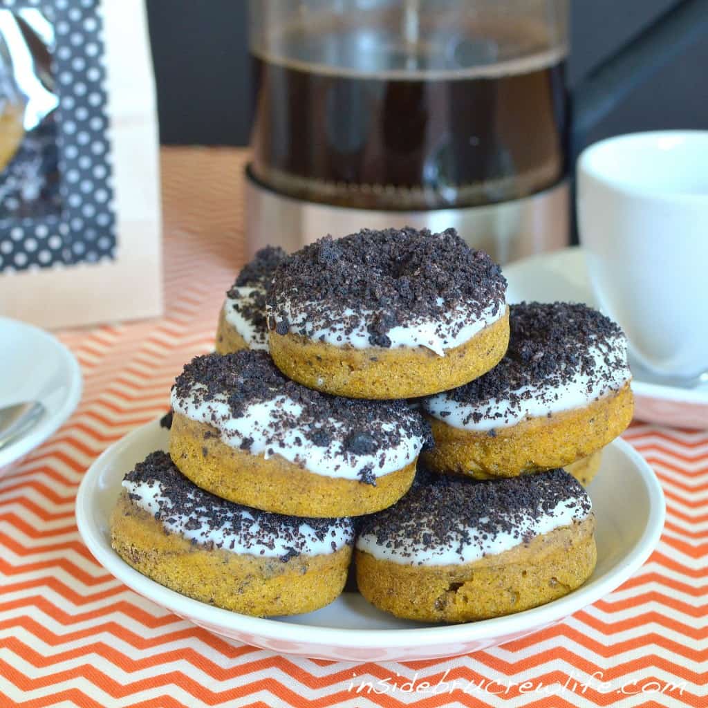 Pumpkin Oreo Donuts from http://www.insidebrucrewlife.com - pumpkin donuts with Oreo topping #pumpkin #donuts pumpkin oreo donuts