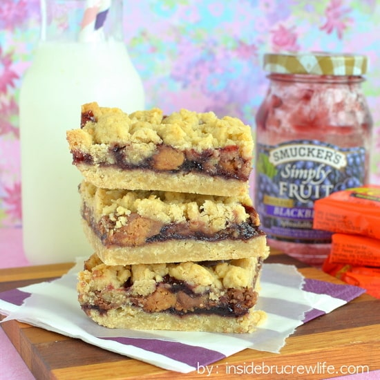 Peanut Butter & Jelly Crumb Bars from Inside BruCrew Life - crumb bars filled with Reese's peanut butter cups and blackberry jelly #peanutbutter #jelly #reeses Peanut Butter & Jelly Crumb Bars from Inside BruCrew Life - crumb bars filled with Reese's peanut butter cups and blackberry jelly #peanutbutter #jelly #reeses