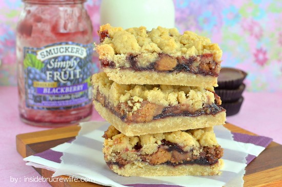Peanut Butter & Jelly Crumb Bars from Inside BruCrew Life - crumb bars filled with Reese's peanut butter cups and blackberry jelly #peanutbutter #jelly #reeses Peanut Butter & Jelly Crumb Bars from Inside BruCrew Life - crumb bars filled with Reese's peanut butter cups and blackberry jelly #peanutbutter #jelly #reeses