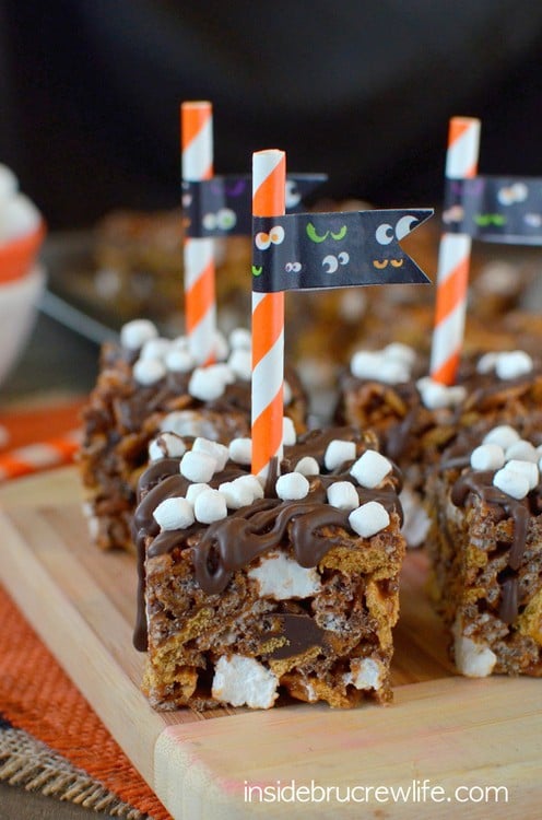 Pumpkin marshmallows give these delicious rice krispie treats a fun twist.  Golden Grahams and chocolate add a s'mores flavor.