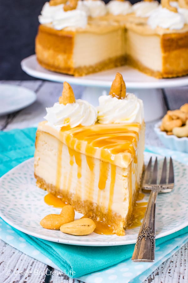 Caramel Cashew Cheesecake - three times the caramel makes this homemade cheesecake a delicious and impressive dessert. Try this easy recipe for parties or events! #cheesecake #caramel #homemadewhippedcream #recipe #cashews