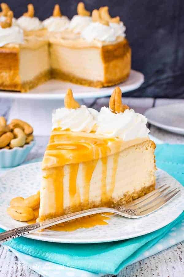 Caramel Cashew Cheesecake - this creamy homemade cheesecake has three times the caramel. The cashew crust gives it such a great flavor. Try this recipe for parties and events. #cheesecake #caramel #homemadewhippedcream #recipe #cashews