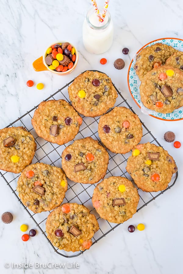 A wire rack with peanut butter banana cookies cooling on it