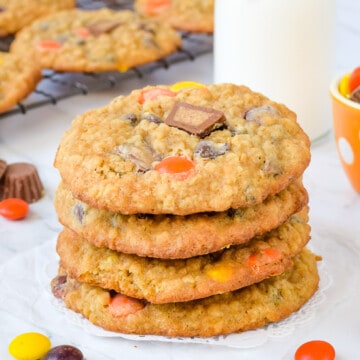 A stack of four peanut butter banana oatmeal cookies