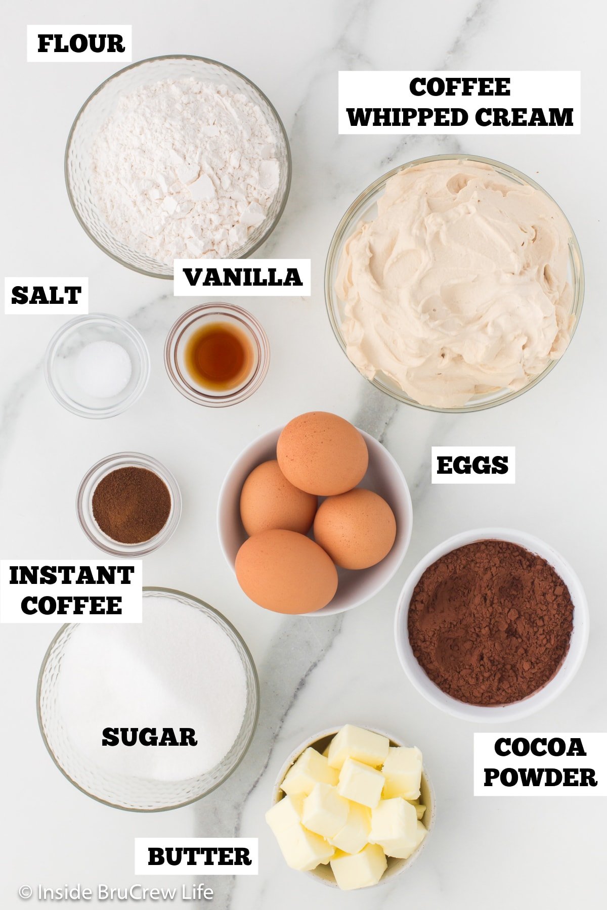 Bowls of ingredients needed to make homemade brownies.