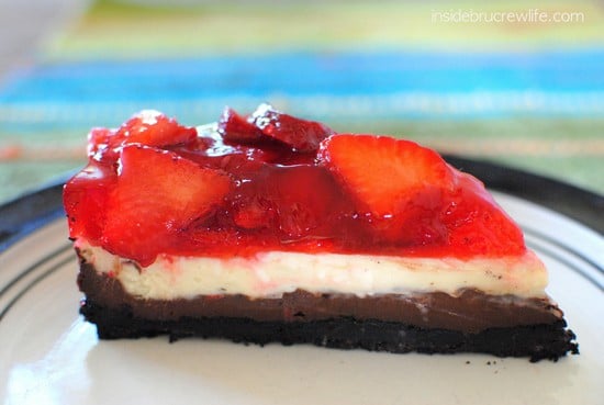 A slice of Strawberry Chocolate Cheesecake on a plate