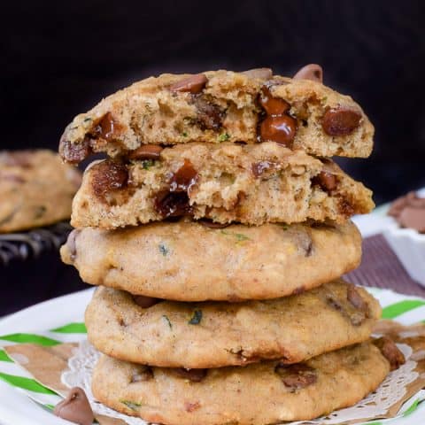 A stack of zucchini cookies on a white plate.