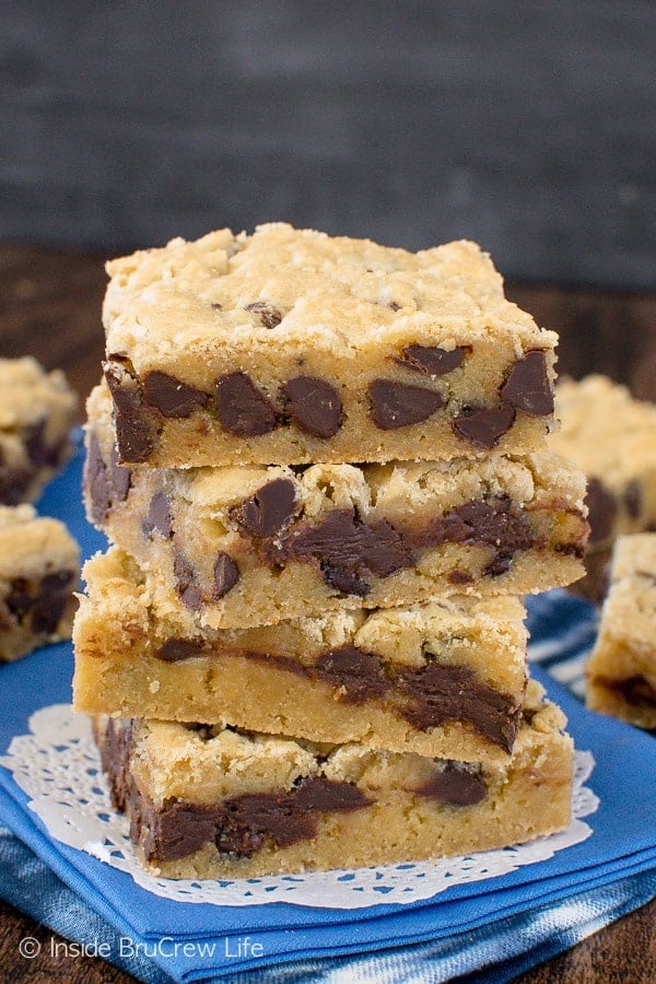 Four congo bars stacked up on a blue towel.