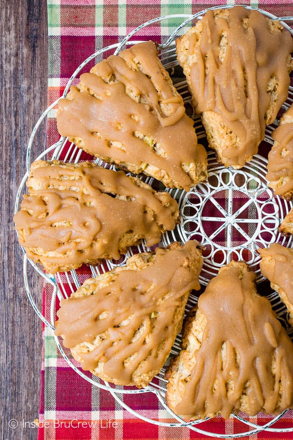 Overhead picture of a white wire tray with caramel apple scones on it