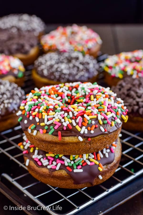 Sour Cream Banana Donuts - homemade banana donuts dipped in chocolate and sprinkles are a fun way to use up ripe bananas! Make this easy recipe for breakfast! #banana #donuts #chocolate #bakeddonuts