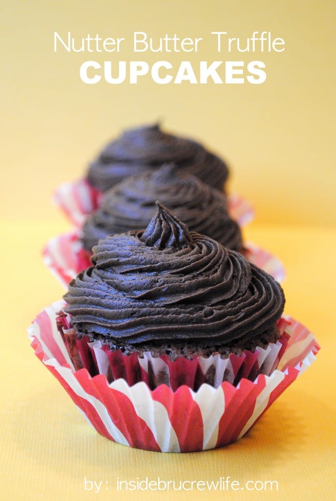 Nutter Butter Truffle Cupcakes - easy brownie cupcakes filled with Nutter Butter cookie truffles and topped with chocolate frosting. Make this fun stuffed cupcake recipe for events and dinner parties! #brownies #chocolate #peanutbutter #frosting