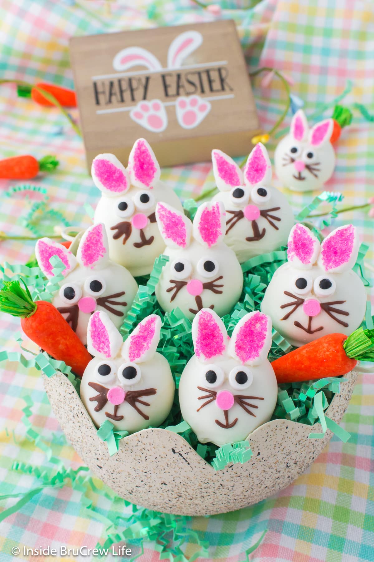 Mini white chocolate bunnies in an egg carton.