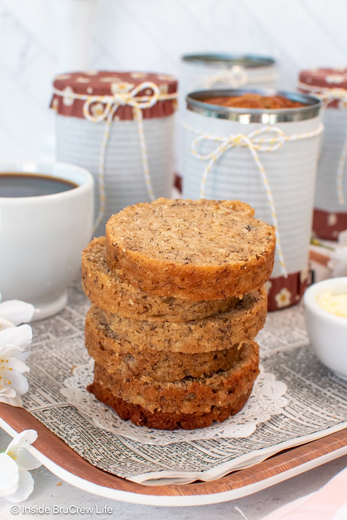 A stack of banana bread slices that were baked in a can.