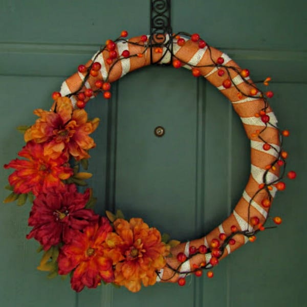 Easy DIY Fall Wreath - wrap a wreath from with burlap and glue flowers and vines around it. #wreath #craft #burlap #fall #easy 