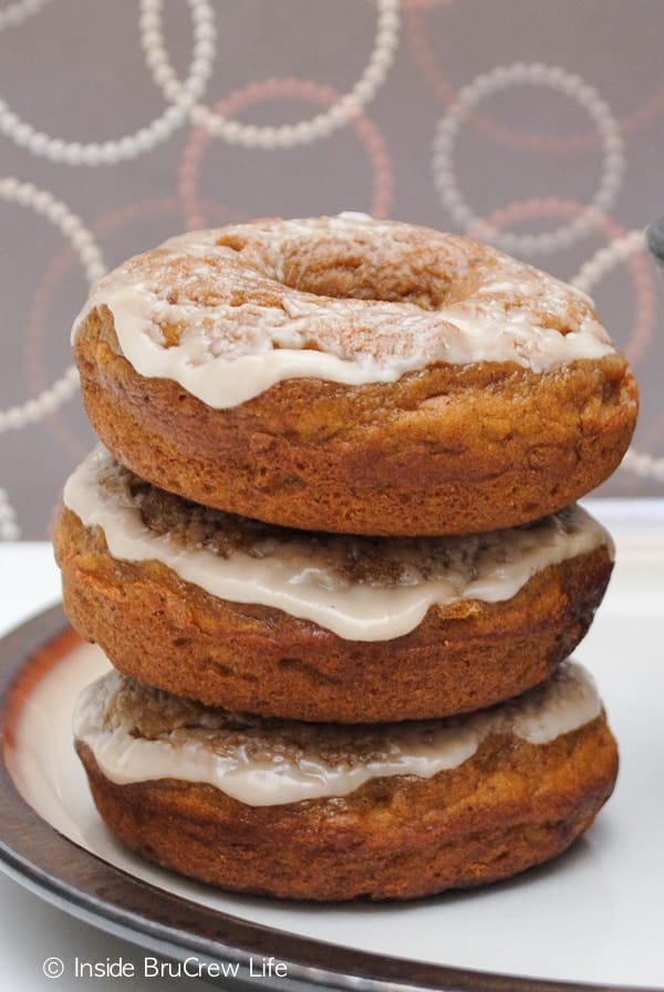 These easy baked pumpkin donuts have caramel chunks and a coffee glaze.