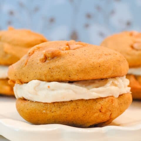 2 pumpkin butterscotch cookies sandwiched with salted caramel frosting.