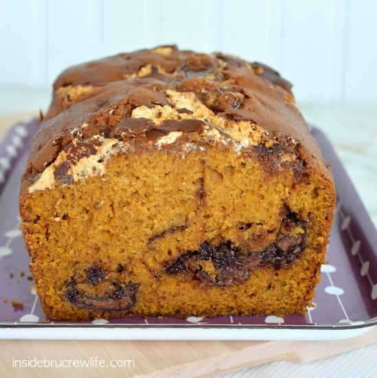 Swirls of chocolate and marshmallow make this Nutella Marshmallow Pumpkin Bread disappear in a hurry. Great fall breakfast recipe!