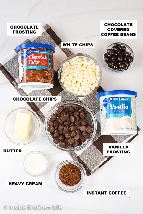 A white board with bowls of ingredients needed to make easy fudge.