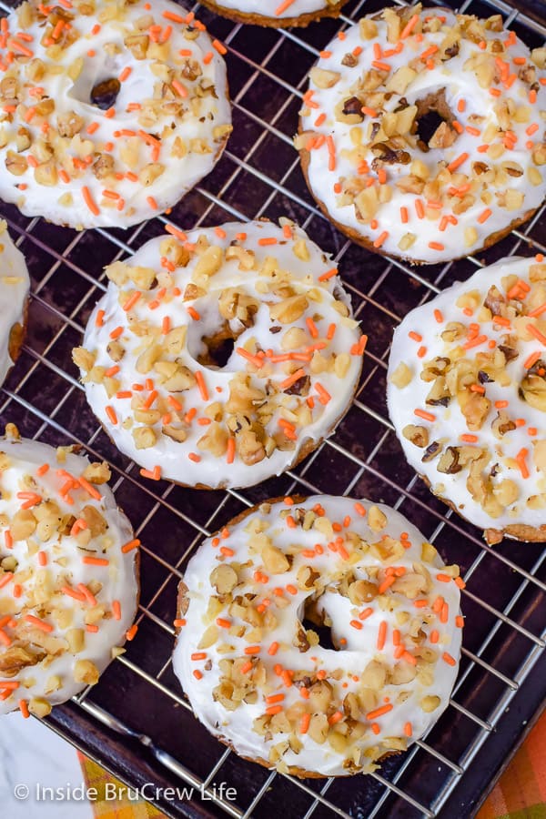 Carrot Cake Donuts - a batch of these soft baked donuts is the perfect way to enjoy carrot cake for breakfast! Make this easy recipe for Easter breakfast. #donuts #bakeddonuts #carrotcake #Easter #breakfast