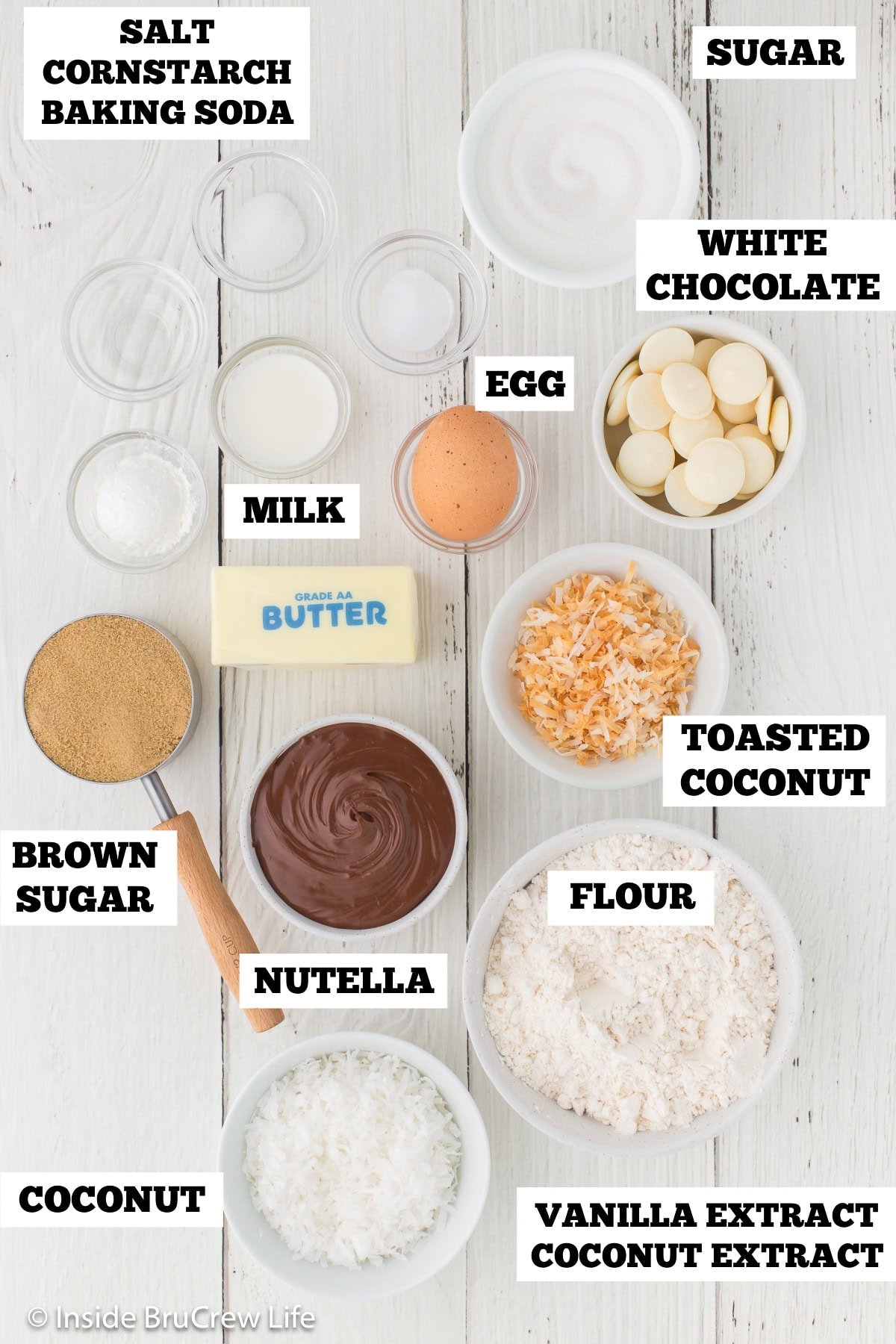 Bowls of ingredients needed to make cookies filled with Nutella.
