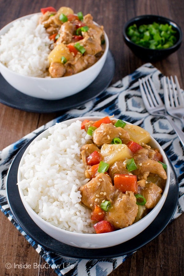Sweet and sour chicken and rice in two white bowls