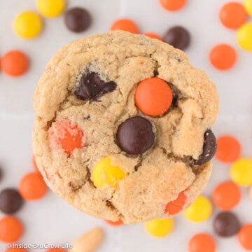 An overhead picture of a cookies with Reese's Pieces.