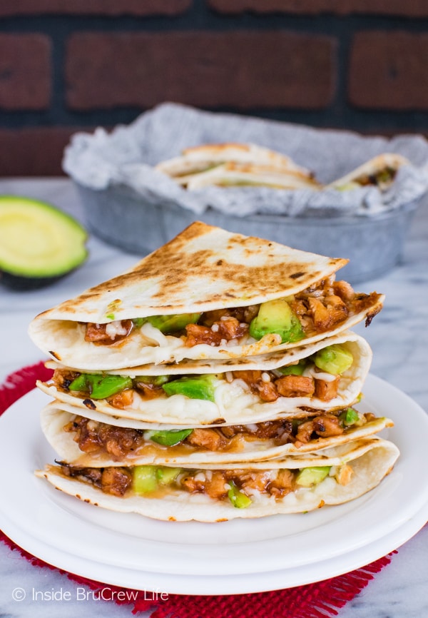 These easy BBQ Chicken & Avocado Quesadillas are full of melted cheese, meat, and avocados. Great dinner recipe.