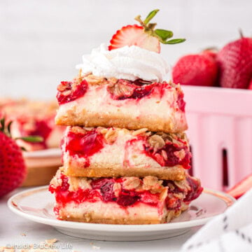 Three strawberry bars stacked on top of each other.