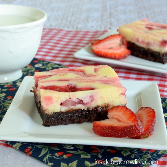 Strawberry Cheesecake Brownies - homemade strawberry pie filling swirls and cheesecake make these brownies a great recipe for any party!