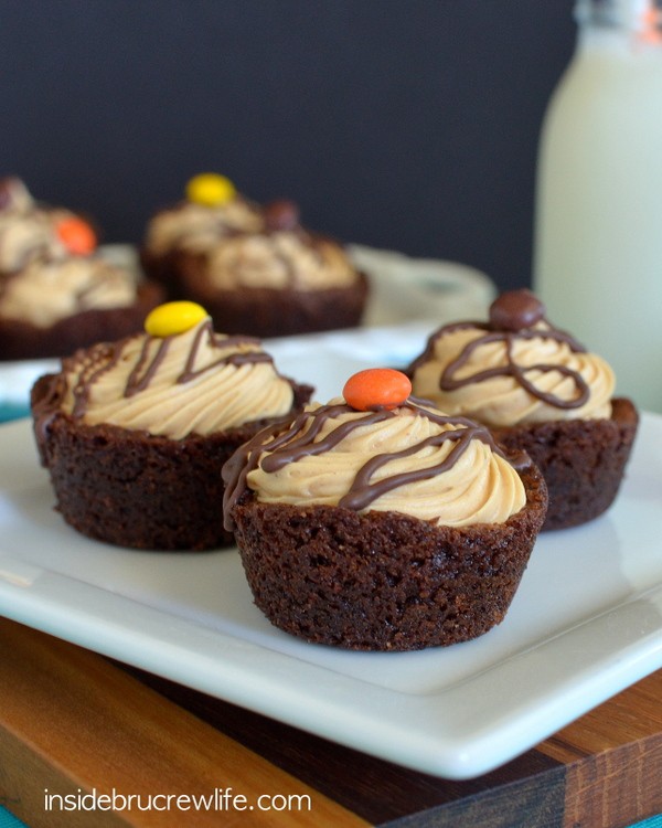 These mini brownies have a hidden marshmallow center and a peanut butter mousse topping.