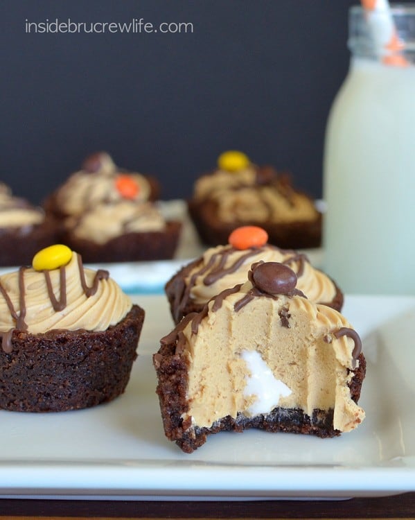 These mini brownies have a hidden marshmallow center and a peanut butter mousse topping.