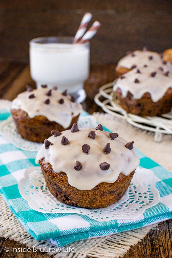 Chocolate Chip Oatmeal Muffins - a coffee glaze adds a fun touch to these chocolate chip muffins. This recipe will make you think you are eating cookies for breakfast! #muffins #oatmeal #chocolatechip #breakfast #coffee