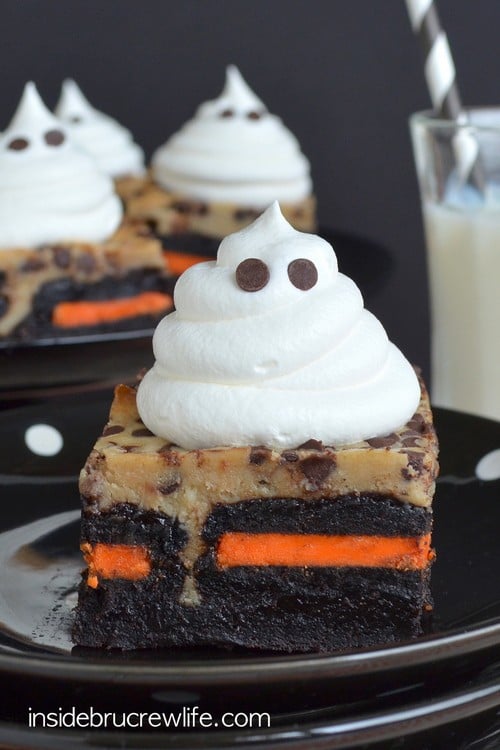 Coffee Cheesecake Oreo Brownies - a hidden layer of cookies and a Cool Whip ghost adds a fun flair to these cheesecake brownies. Delicious recipe to share at Halloween parties!