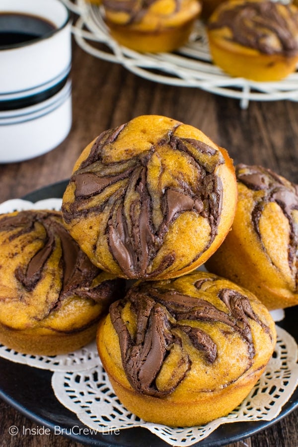 Pumpkin Nutella Muffins - these soft pumpkin muffins have a chocolate swirl that makes them delicious. Try this recipe for breakfast this fall. #breakfast #muffins #pumpkin #nutella #fall