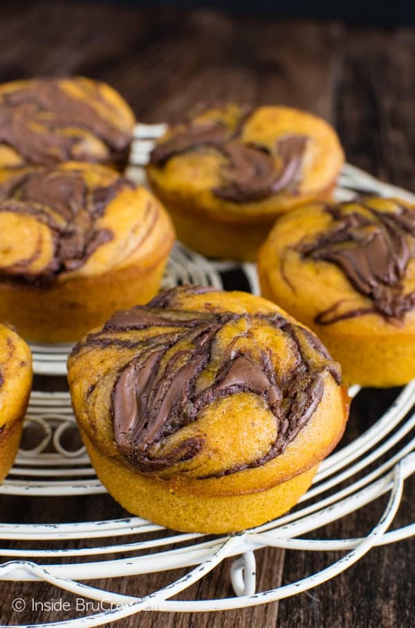 Pumpkin Nutella Muffins - swirls of chocolate in these soft muffins will make them disappear. Make this breakfast recipe this fall. #breakfast #muffins #pumpkin #nutella #fall