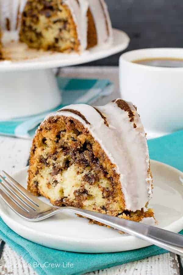 Best Sour Cream Chocolate Chip Coffee Cake - the sweet cinnamon sugar swirl and chocolate chips make this a decadent cake. Awesome recipe to make for breakfast or brunch. #breakfast #coffeecake #bundtcake #recipe #brunch