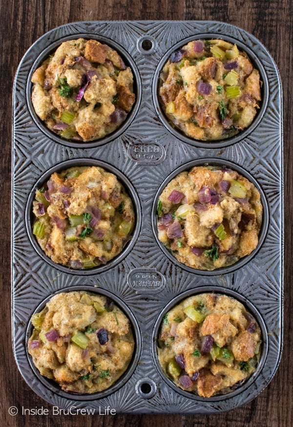 Overhead picture of a a muffin tin with stuffing muffins baked in it