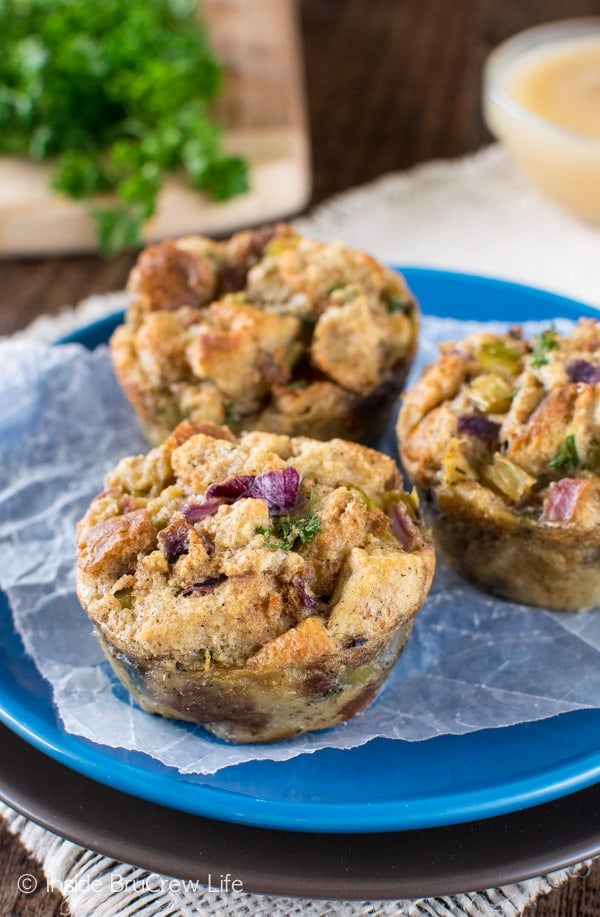 Close up of stuffing muffins on a blue plate