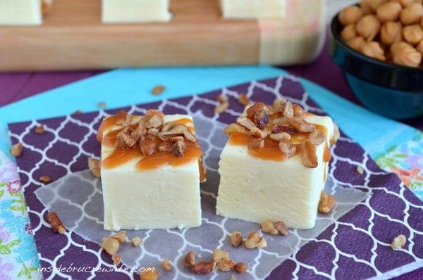 This easy cheesecake fudge is topped with caramel and pecans for a fun turtle taste!