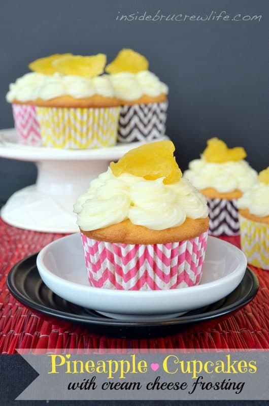 Pineapple Cupcakes - vanilla cupcakes filled with pineapple preserves and topped with cream cheese frosting 