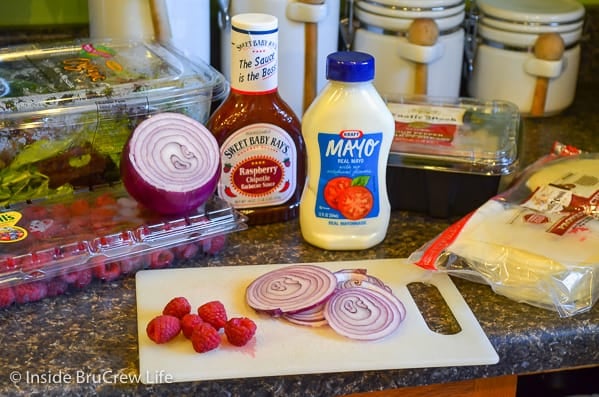 Ingredients for a Raspberry Chipotle Turkey Pita on a kitchen counter