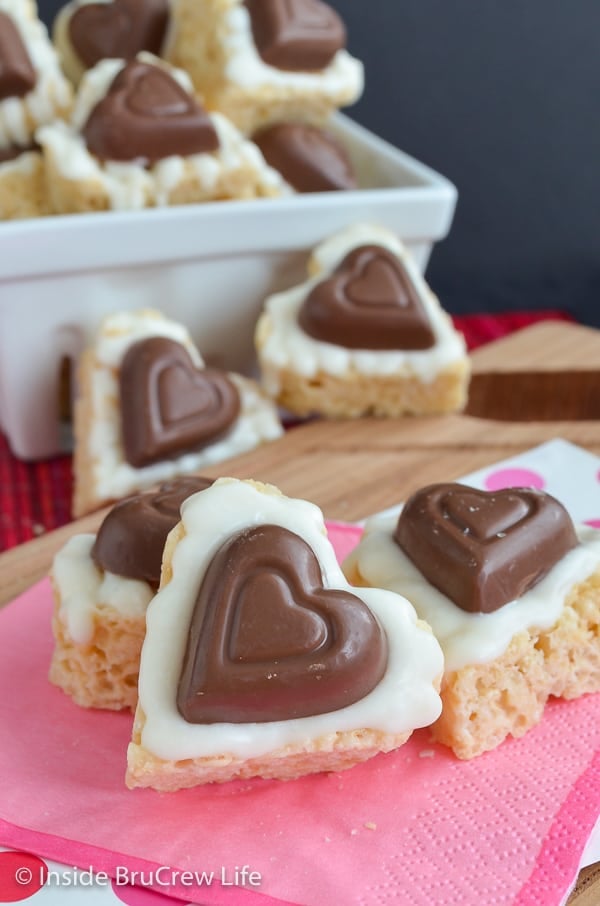 Rice krispie treats in the shape of a heart covered in white chocolate. 