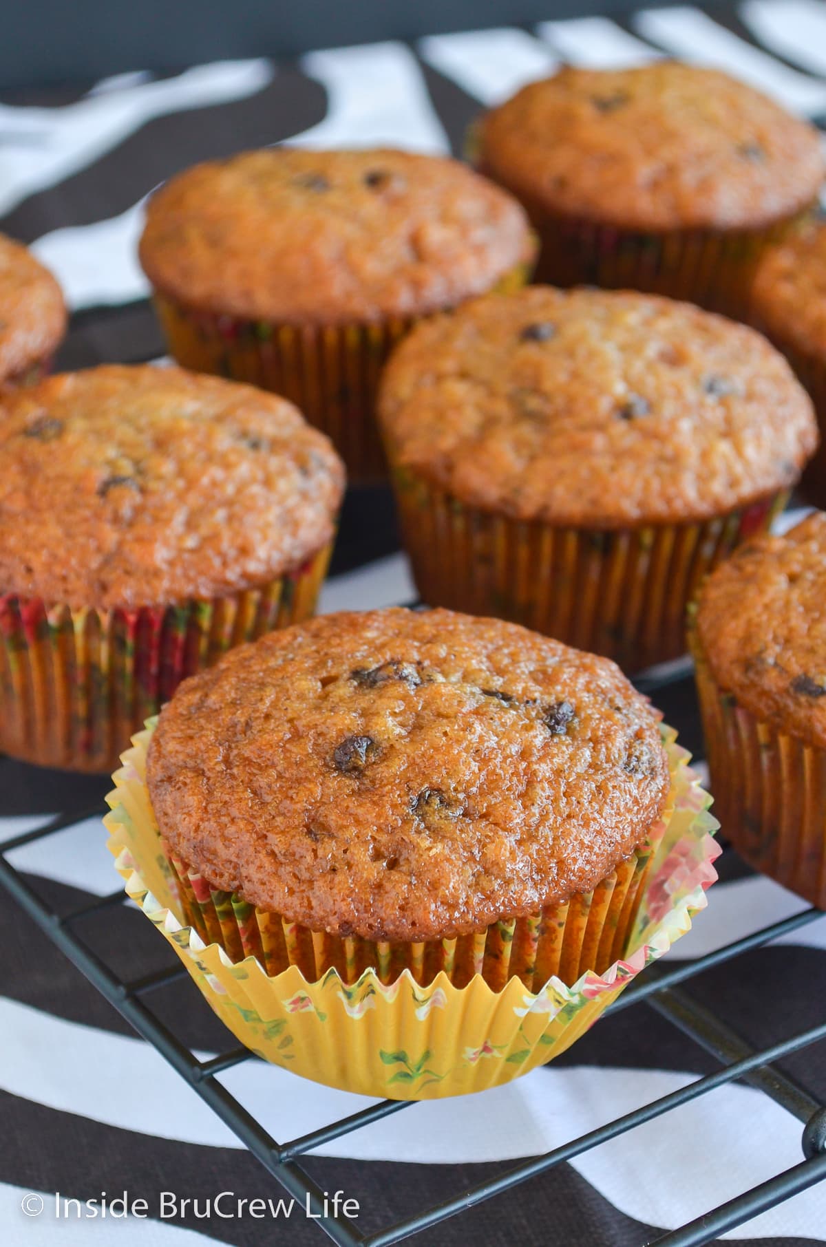 Banana muffins on a wire rack.