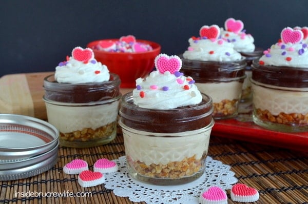 Layers of pretzels, caramel cheesecake, and chocolate pudding makes these easy No Bake Caramel Mud Pie Cups a fun dessert!