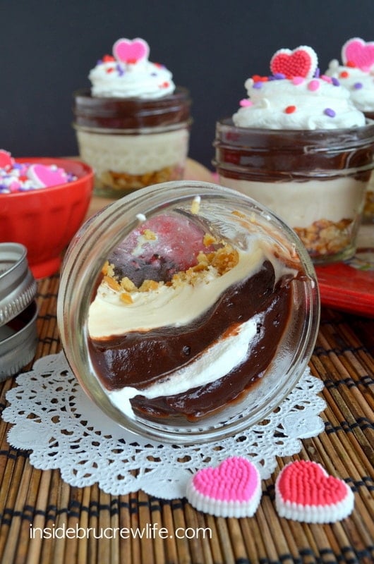 Pretzel crust, caramel cheese, and chocolate pudding make these No Bake Caramel Mud Pie Cups amazing!