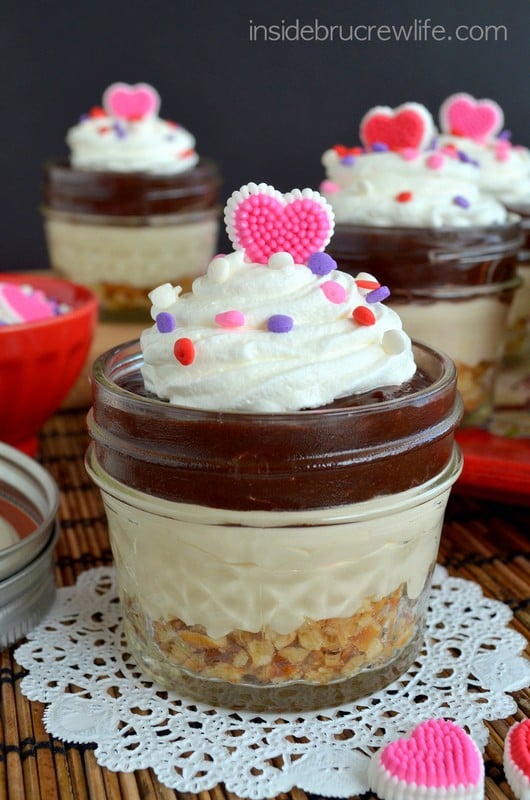 Layers of pretzels, caramel cheesecake, and chocolate pudding makes these easy No Bake Caramel Mud Pie Cups a fun dessert!