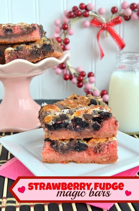 Strawberry Fudge Magic Bars from www.insidebrucrewlife.com - strawberry, fudge, and Oreos in one amazing magic bar