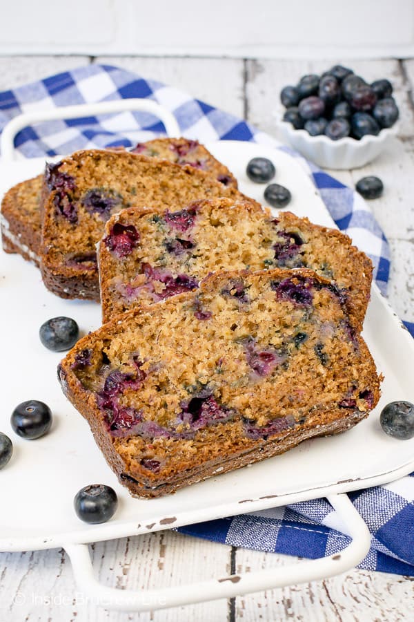 Blueberry Banana Bread - this classic banana bread gets a healthy twist from yogurt and honey. Great recipe to make for breakfast or an after school snack. #banana #blueberries #sweetbread #healthy #breakfast #bananabread #recipe