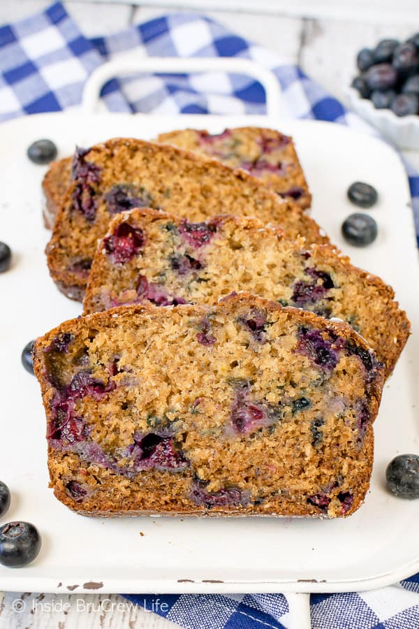 Blueberry Banana Bread - yogurt and honey gives this classic banana bread a healthy twist. Make this easy recipe for breakfast or after school snacks. #banana #blueberries #sweetbread #healthy #breakfast #bananabread #recipe