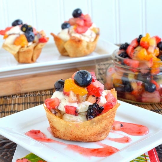 A close up picture of a cinnamon sugar cup filled with frozen yogurt and fruit salsa